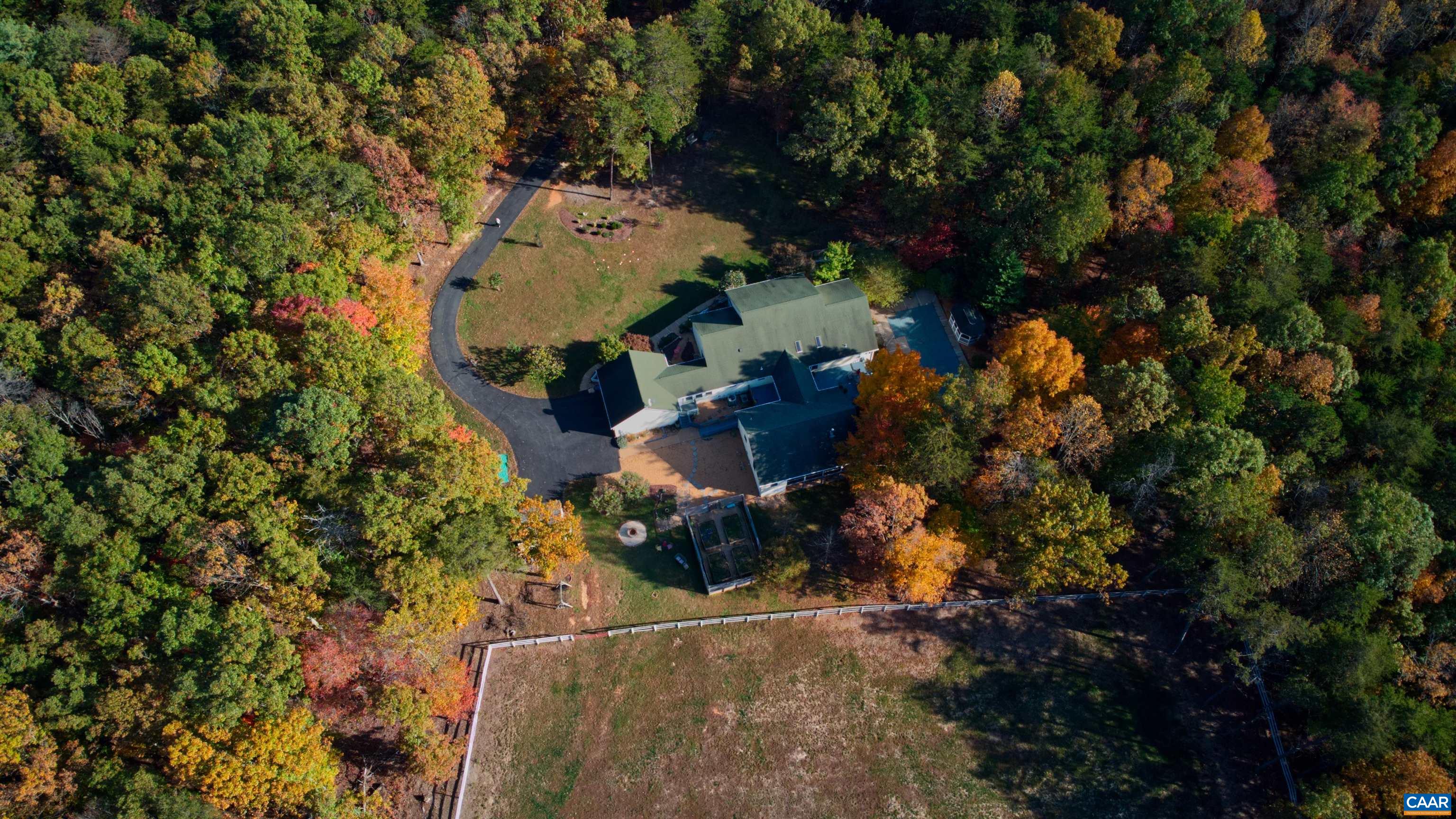 340 Beaver Pond Ridge Troy, VA 22974 - Photo 52 of 53 an aerial view of a house with a yard and large trees