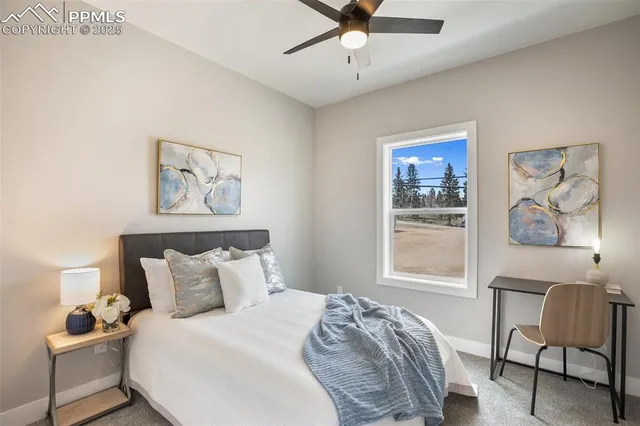 a bedroom with a bed and chair