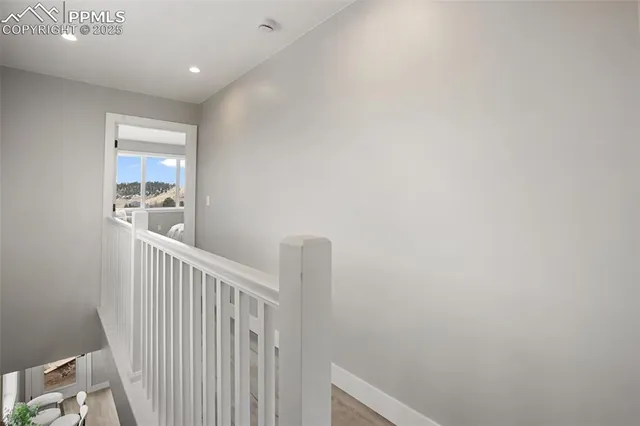 a view of hallway with windows