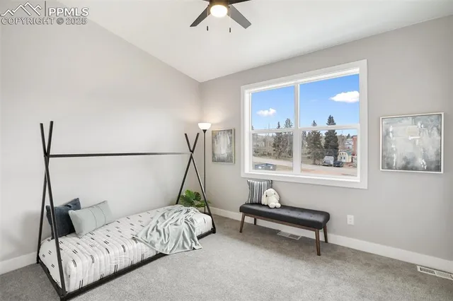 a living room with furniture and window