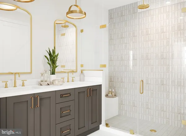 a bathroom with a sink a mirror and shower