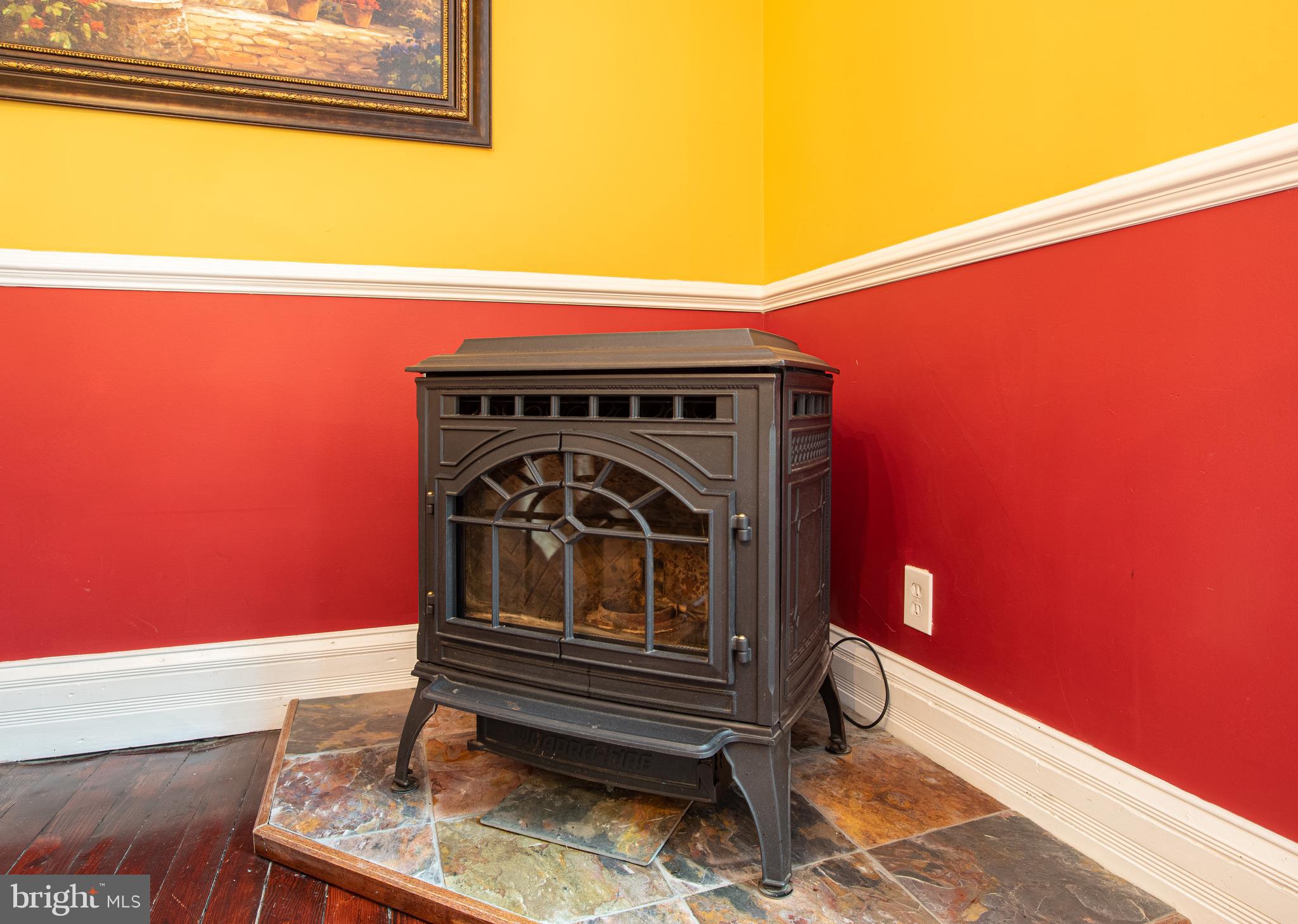 18123 School House Road White Hall, MD 21161 - Photo 13 of 47 Pellet Stove in Dining Room