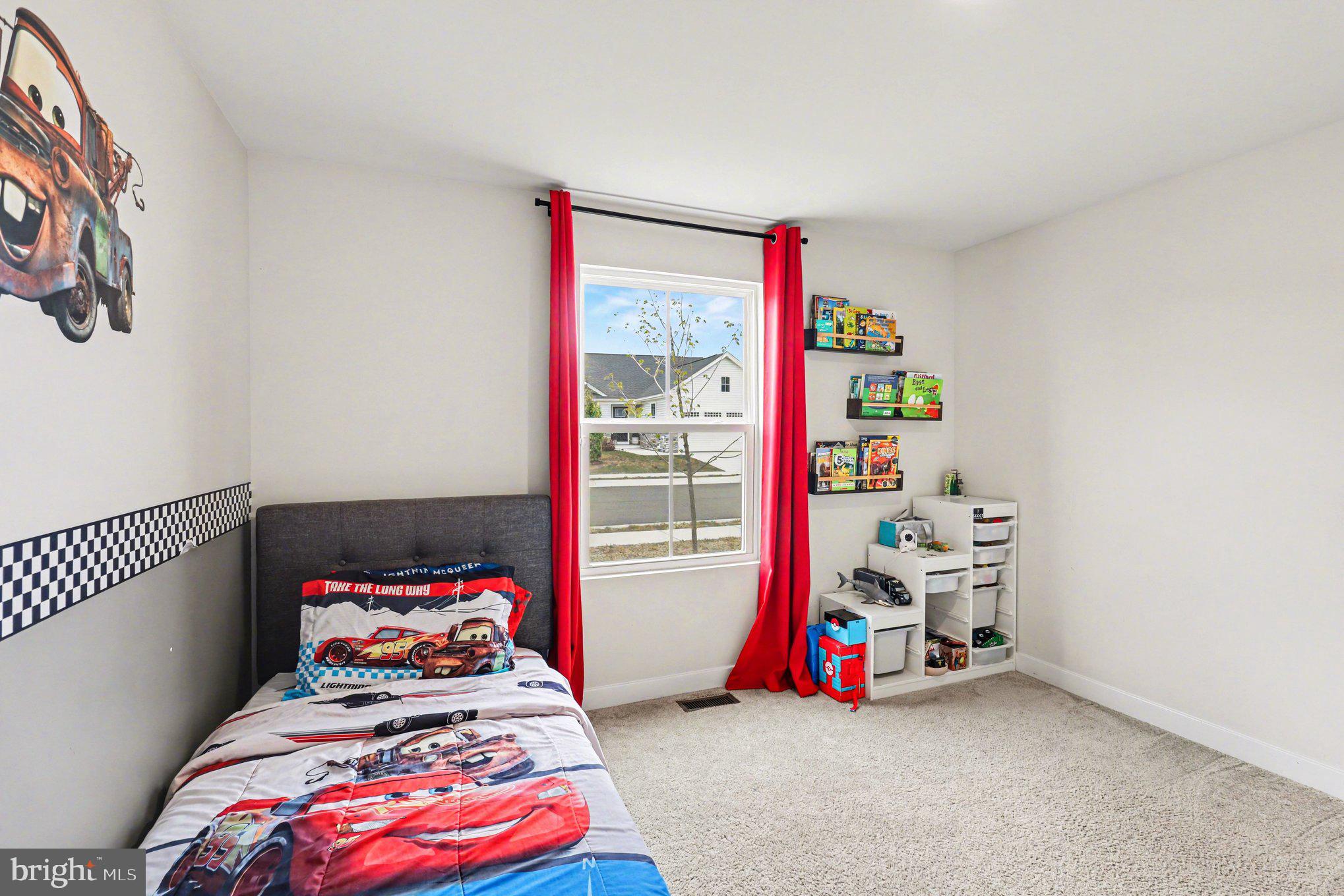 7202 Parchment Circle Ruther Glen, VA 22546 - Photo 19 of 30 a bedroom with bed and a window