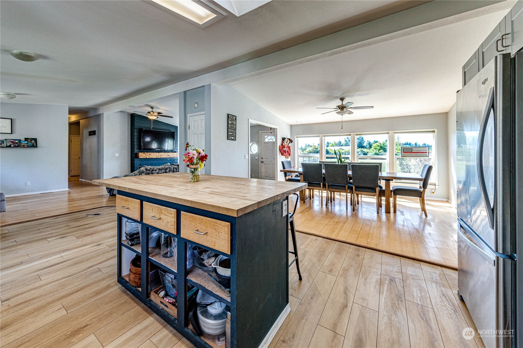 973 Towne Road Sequim, WA 98382 - Photo 12 of 40 a view of a dining room with furniture window and wooden floor