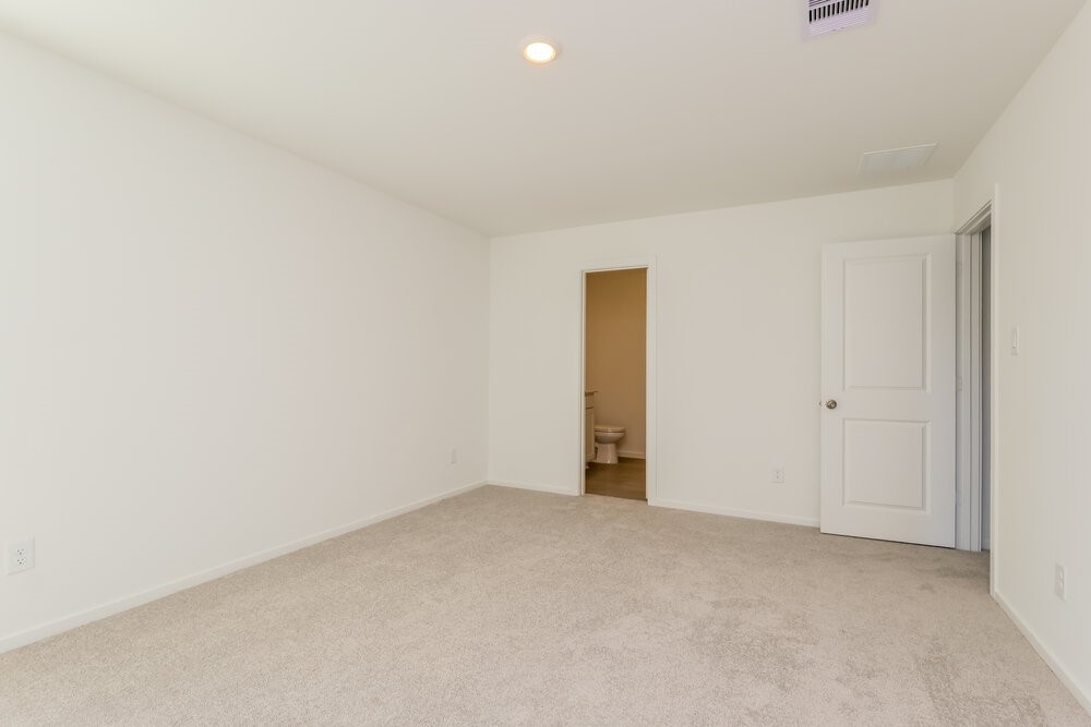 2612 Shady Cedar Court Conroe, TX 77301 - Photo 11 of 17 a view of an empty room