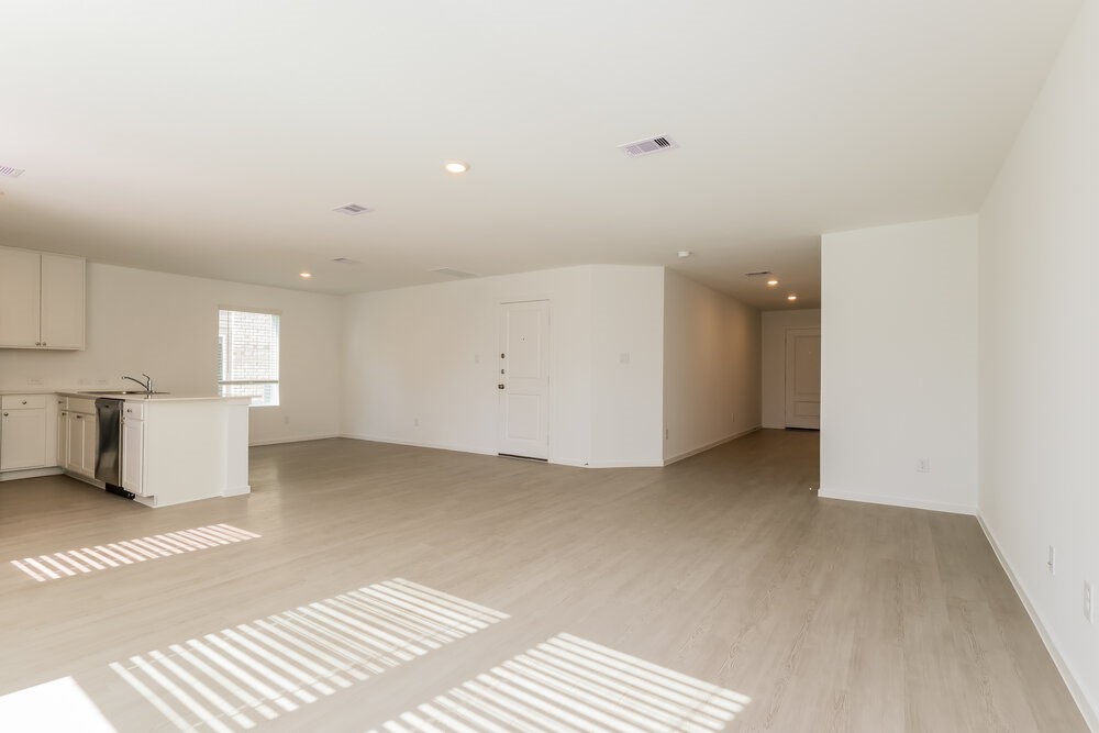 2612 Shady Cedar Court Conroe, TX 77301 - Photo 5 of 17 a view of a room with a sink and cabinets