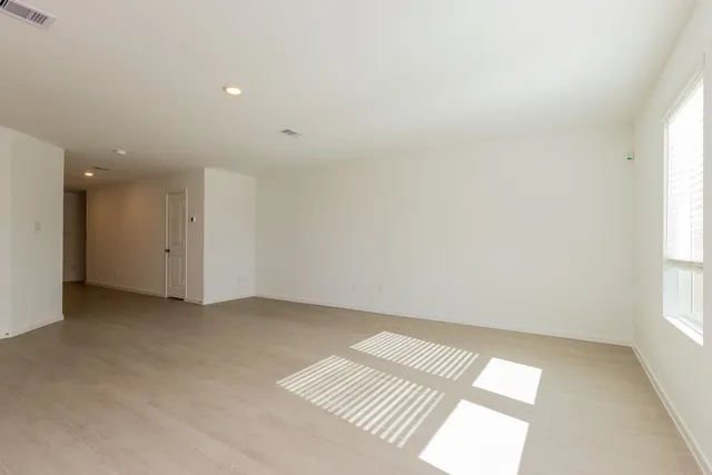 a view of a kitchen with electric appliances