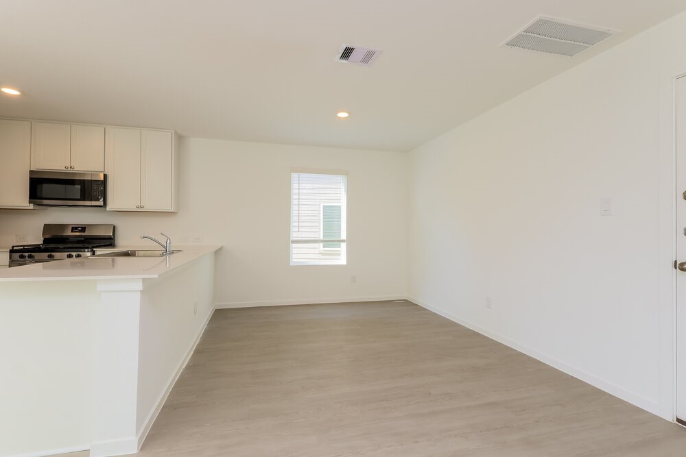 2612 Shady Cedar Court Conroe, TX 77301 - Photo 7 of 17 a view of a kitchen with electric appliances