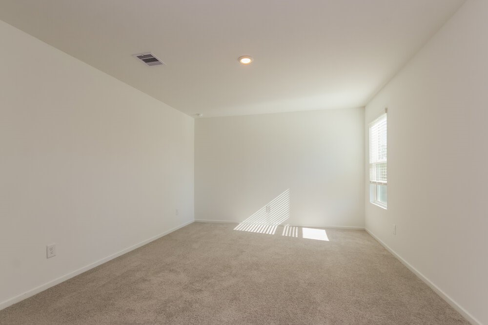 2612 Shady Cedar Court Conroe, TX 77301 - Photo 10 of 17 an empty room with a window