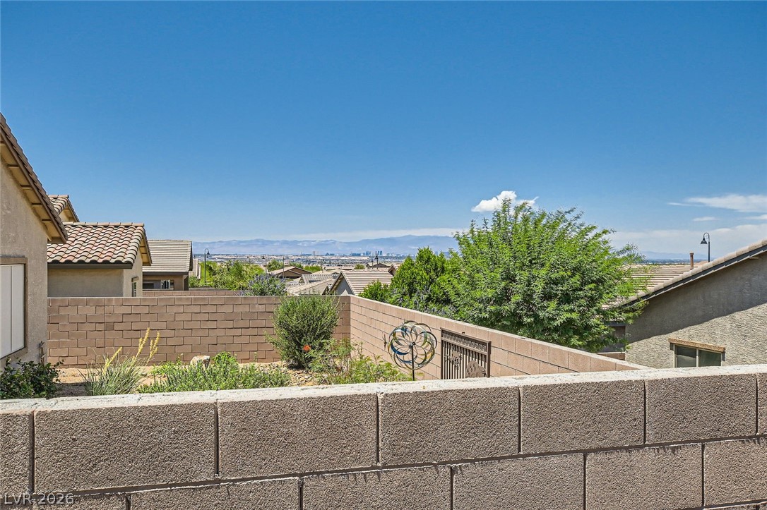 498 Pebble Run Avenue Henderson, NV 89011 - Photo 26 of 47 Capture breathtaking city and mountain panoramas from this elevated outdoor space.