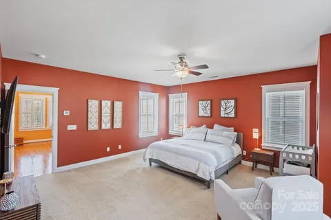 a white bath tub sitting next to a window