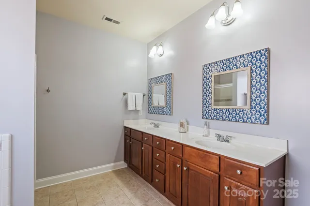a white bath tub sitting next to a window