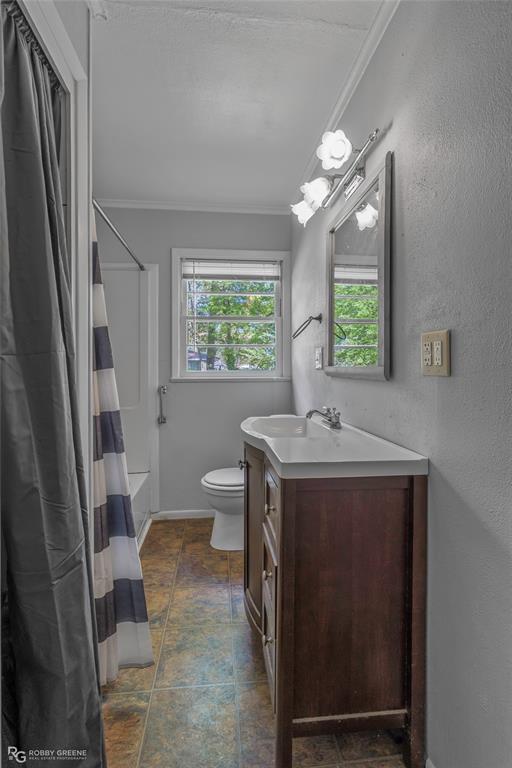 5725 Harper Road Keithville, LA 71047 - Photo 35 of 35 a bathroom with a sink a toilet and a mirror