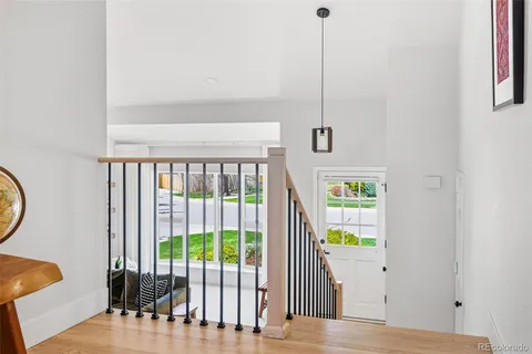 a view of a hallway with windows