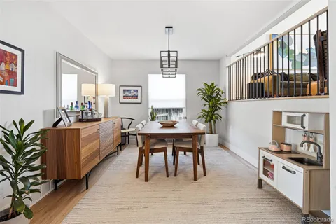 a kitchen with a table and chairs in it