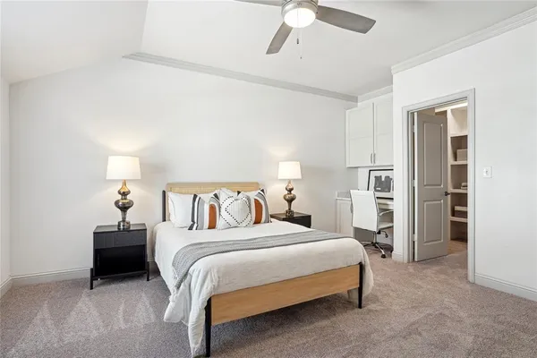 a bedroom with a bed and closet