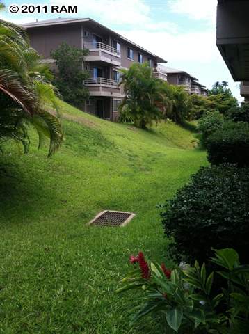 2747 South Kihei Road, Unit F109 Kihei, HI 96753 - Photo 2 of 2 a view of a house with a backyard