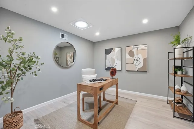 a view of a workspace with furniture