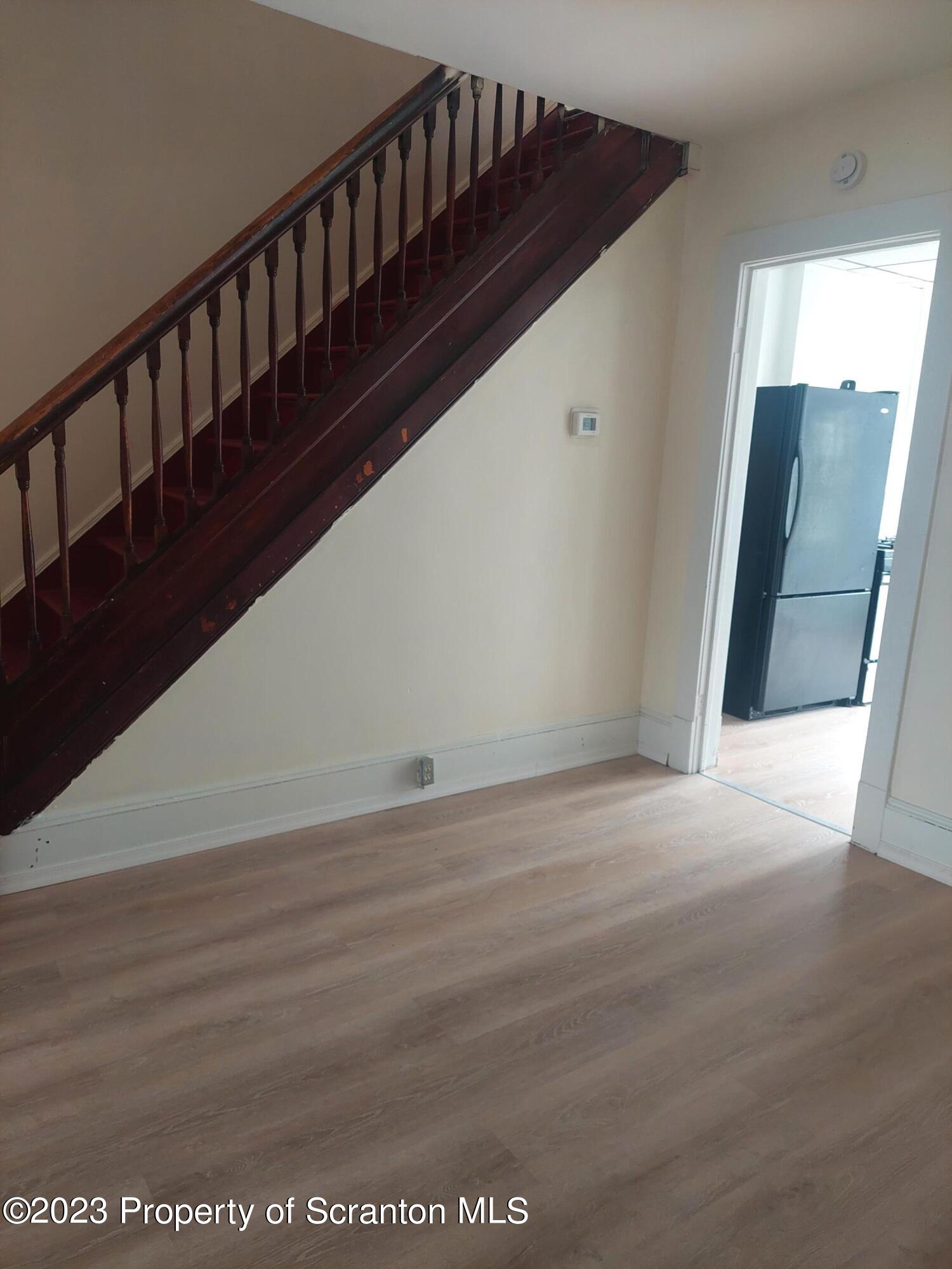 1703 Cedar Avenue Scranton, PA 18505 - Photo 11 of 14 a view of wooden floor in a room