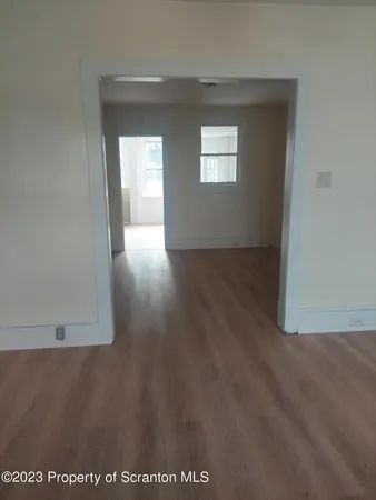 a view of livingroom and hardwood