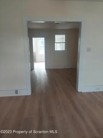 a view of livingroom and hardwood