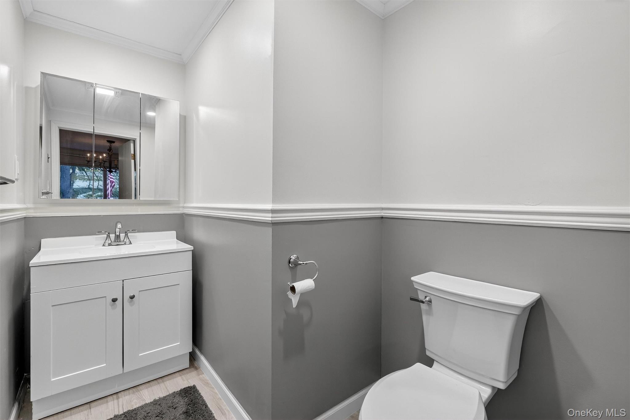 114 Laurel Hill Road Croton-on-Hudson, NY 10520 - Photo 25 of 30 a bathroom with a toilet sink and mirror