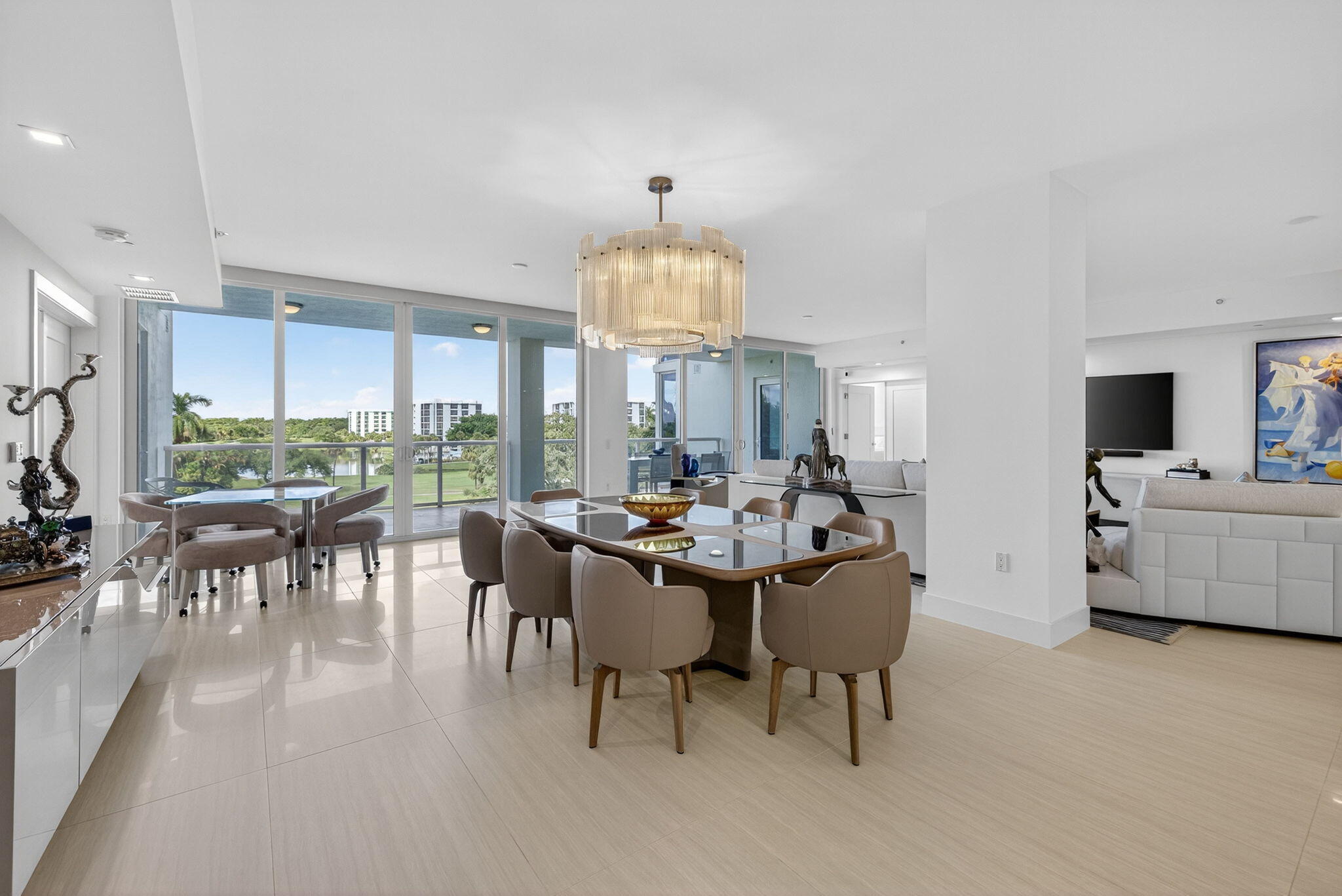 20155 Boca W Drive, Unit C302 Boca Raton, FL 33434 - Photo 2 of 78 a view of a dining room with furniture window and outside view