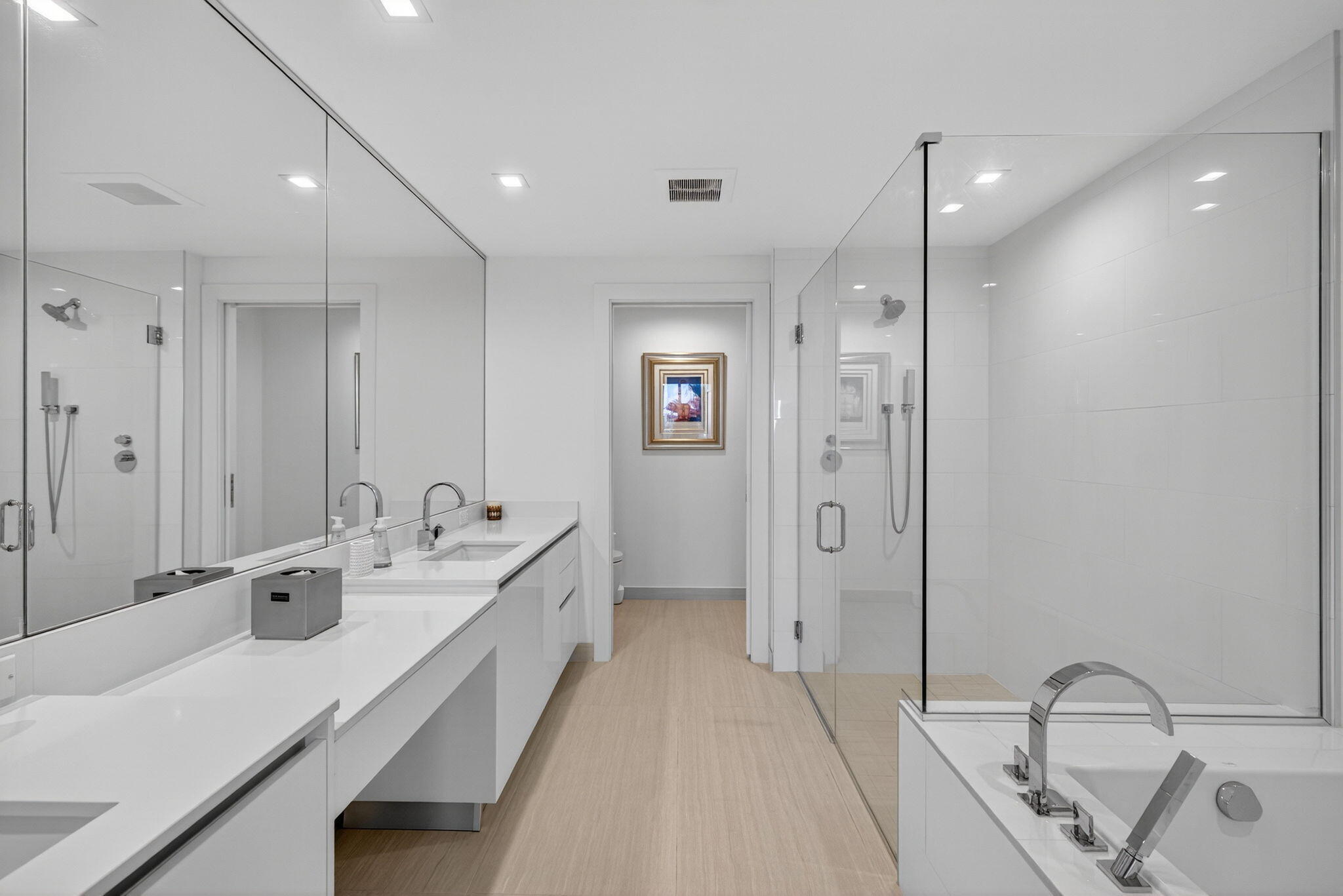 20155 Boca W Drive, Unit C302 Boca Raton, FL 33434 - Photo 23 of 78 a bathroom with a double vanity sink a mirror and shower