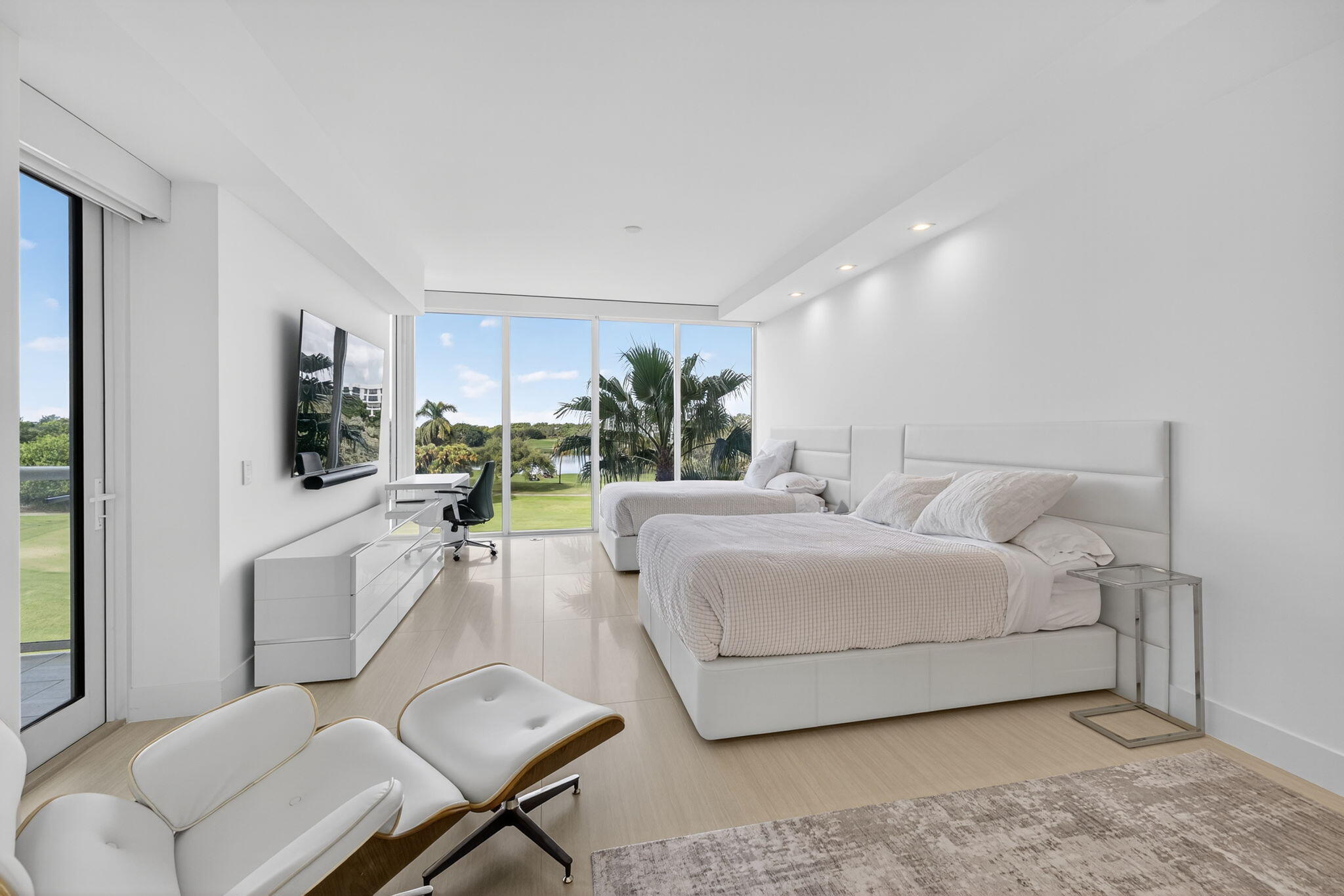 20155 Boca W Drive, Unit C302 Boca Raton, FL 33434 - Photo 29 of 78 a living room with furniture and a large window