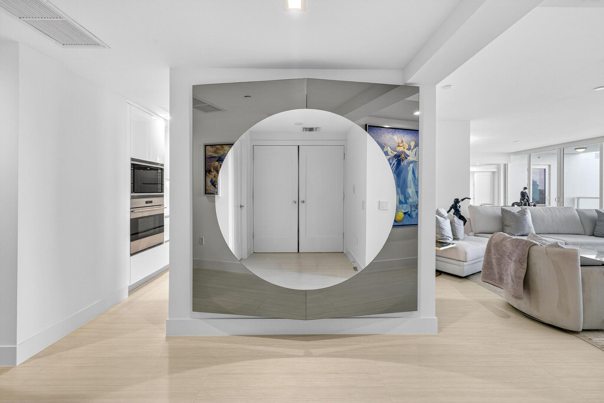 20155 Boca W Drive, Unit C302 Boca Raton, FL 33434 - Photo 36 of 78 a living room with furniture and a large mirror