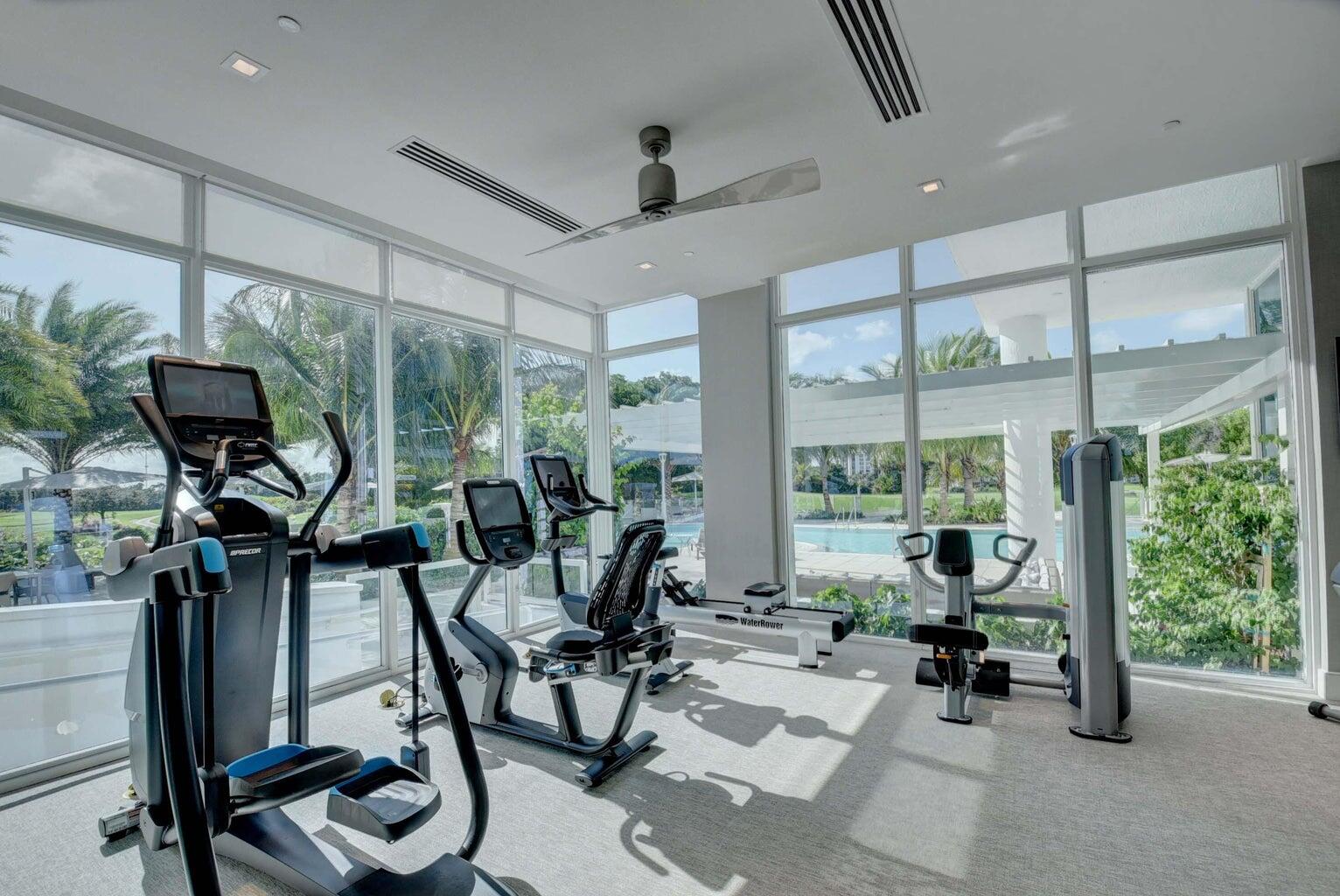 20155 Boca W Drive, Unit C302 Boca Raton, FL 33434 - Photo 39 of 78 a view of a room with gym equipment