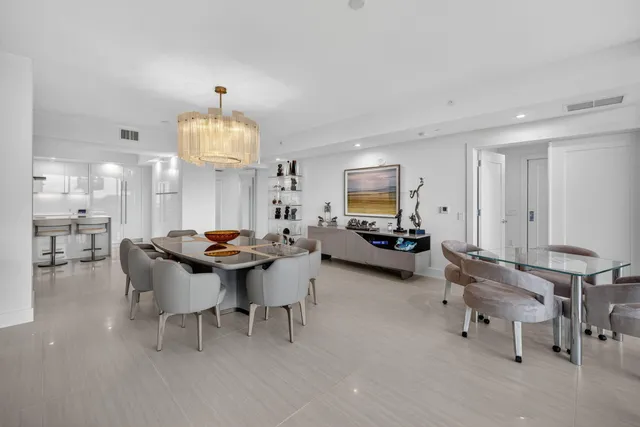 a bathroom with a double vanity sink and a toilet