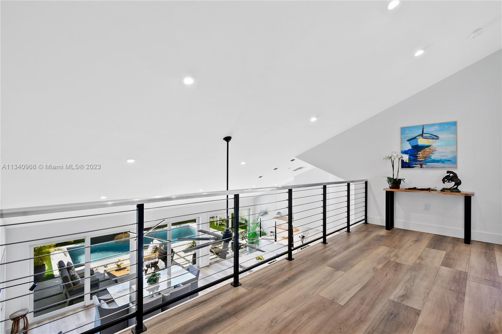 136 Sand Pine Drive Jupiter, FL 33477 - Photo 18 of 30 a view of an entryway with hardwood