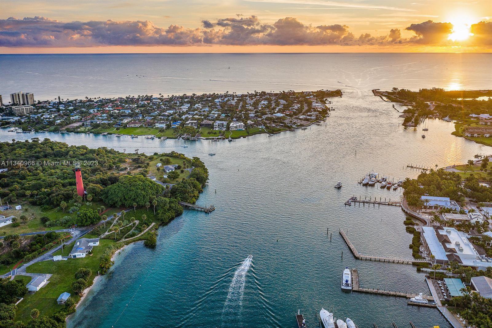 136 Sand Pine Drive Jupiter, FL 33477 - Photo 29 of 30 a view of a city and ocean view