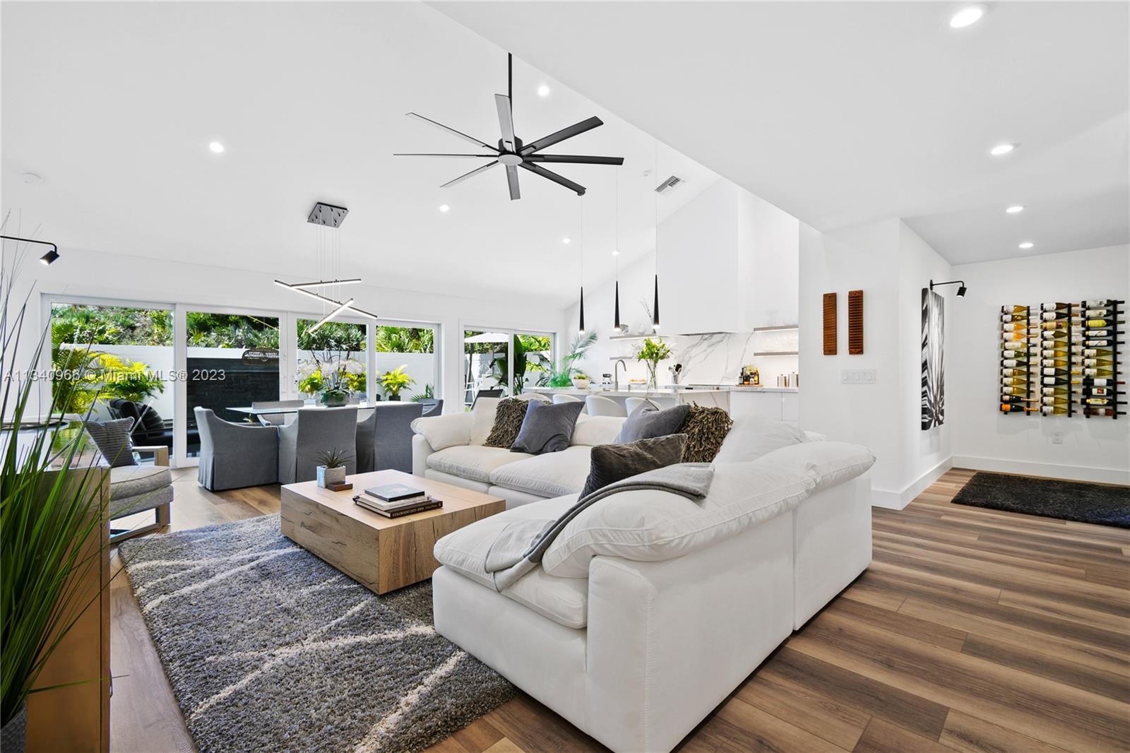 136 Sand Pine Drive Jupiter, FL 33477 - Photo 3 of 30 a living room with furniture and a large window
