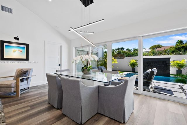 a bathroom with a sink and a window