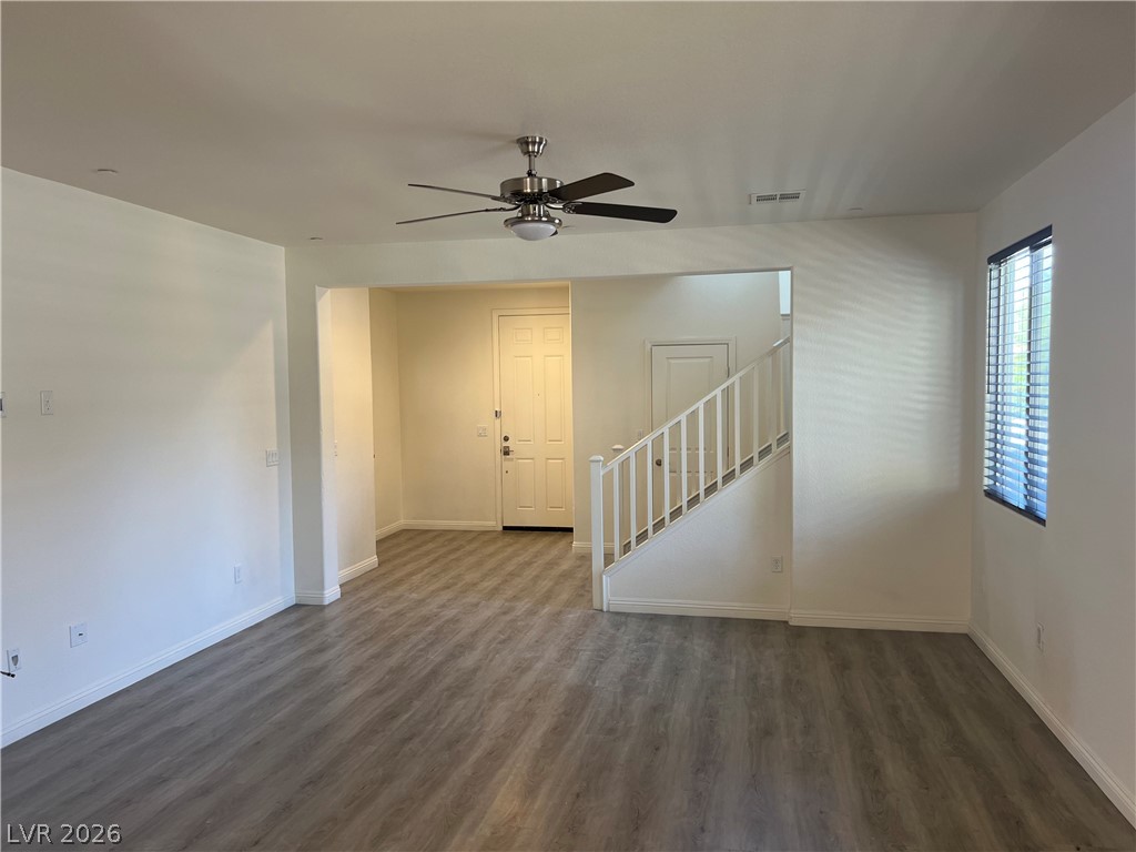 9581 Aberdeen Ridge Court Las Vegas, NV 89148 - Photo 5 of 25 A welcoming entryway with fresh flooring and a stylish ceiling fan offers comfort.