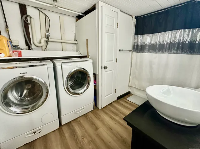 a utility room with dryer and washer
