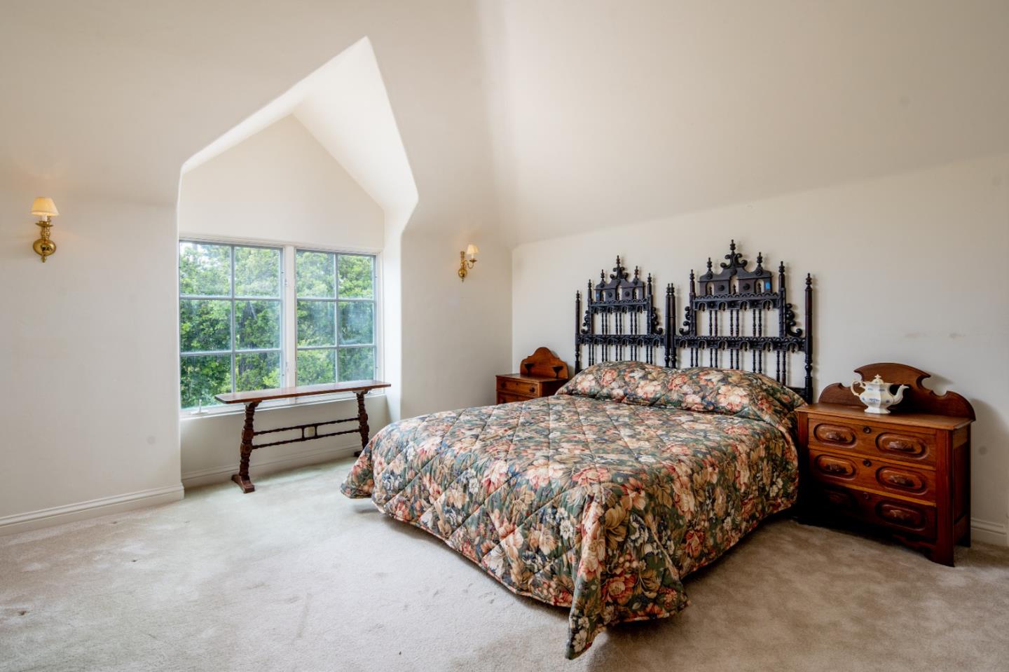 3210 Macomber Drive Pebble Beach, CA 93953 - Photo 14 of 14 a bed sitting in a bedroom next to a window