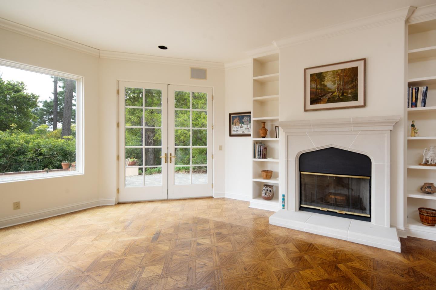 3210 Macomber Drive Pebble Beach, CA 93953 - Photo 4 of 14 a view of a livingroom with a fireplace and window