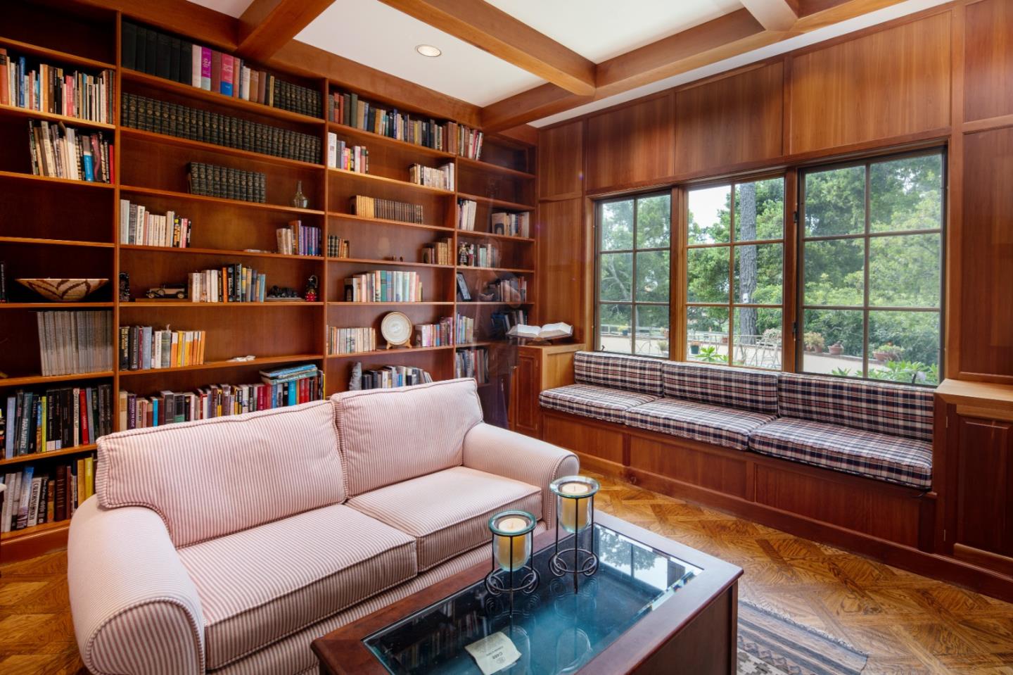 3210 Macomber Drive Pebble Beach, CA 93953 - Photo 8 of 14 a living room with furniture and a book shelf