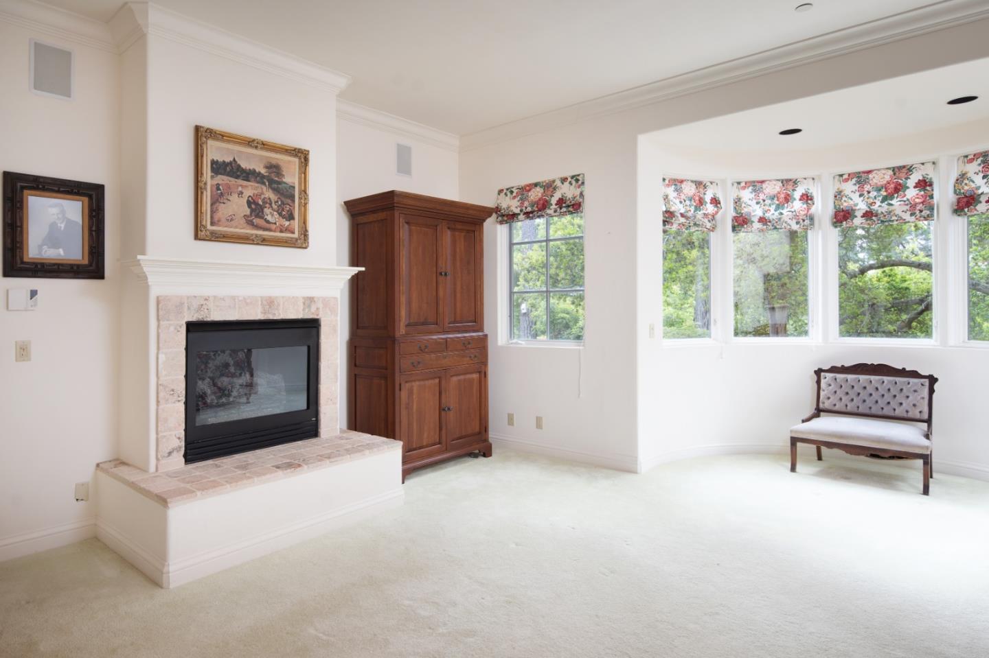 3210 Macomber Drive Pebble Beach, CA 93953 - Photo 9 of 14 a living room with furniture and a fireplace