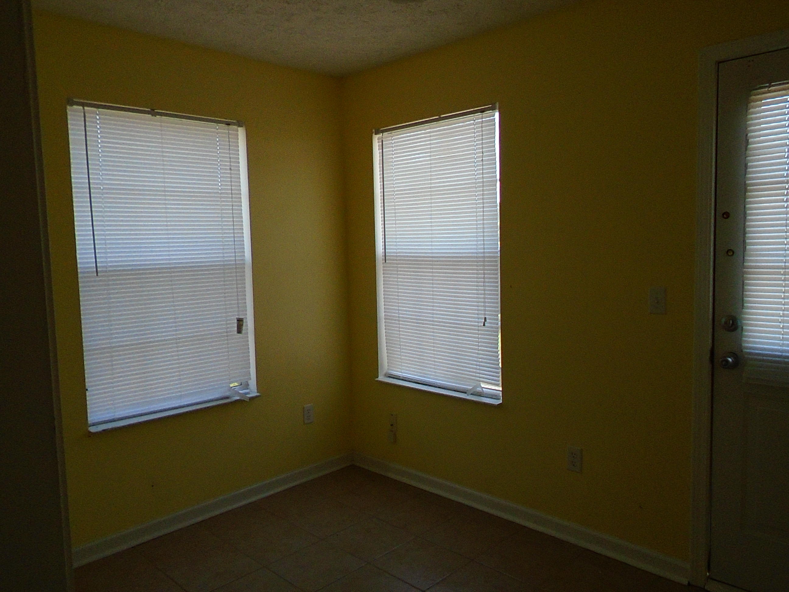 87 Tropical Way Freeport, FL 32439 - Photo 11 of 12 a small space with a window