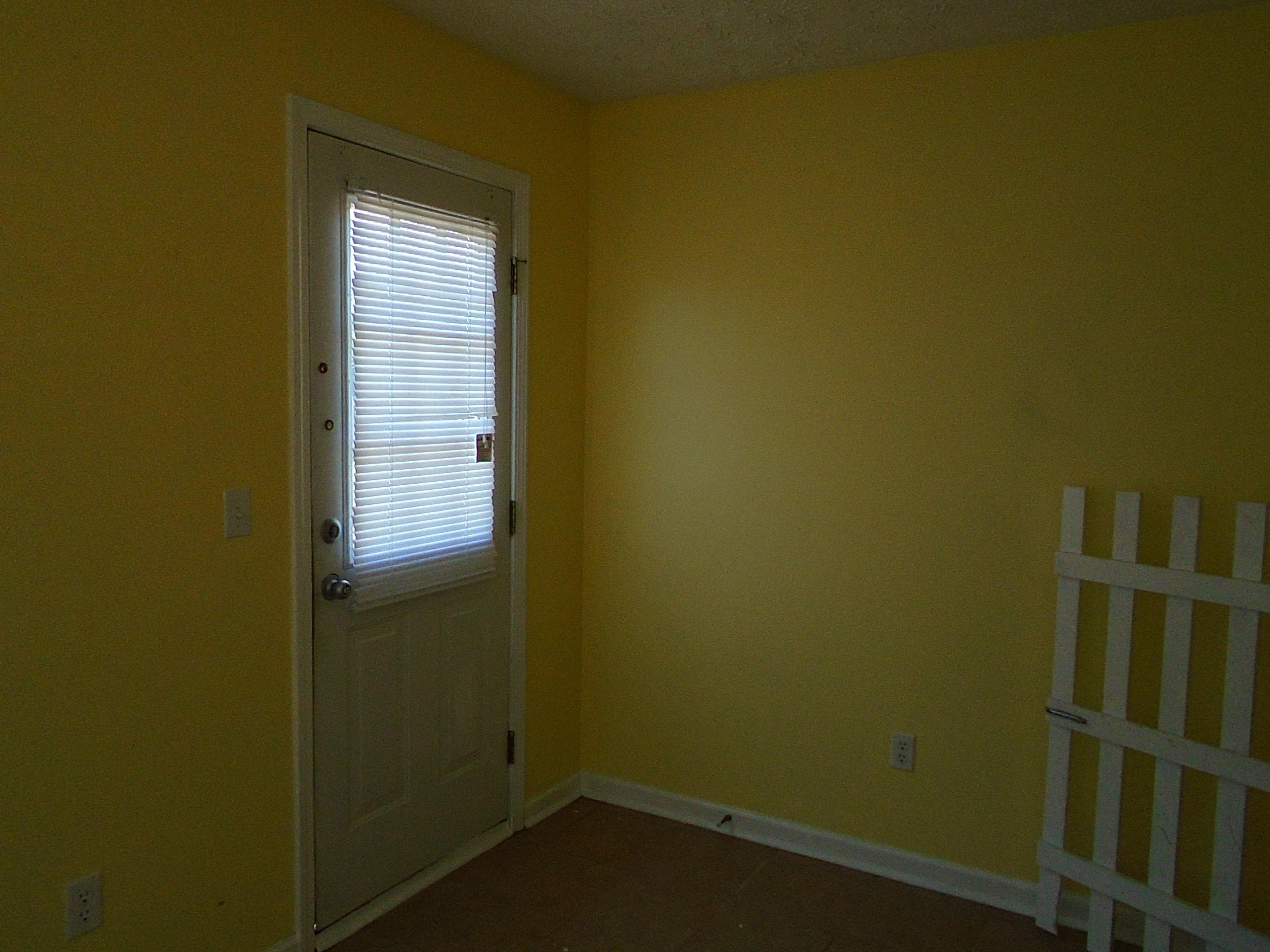 87 Tropical Way Freeport, FL 32439 - Photo 8 of 12 a small space with a window