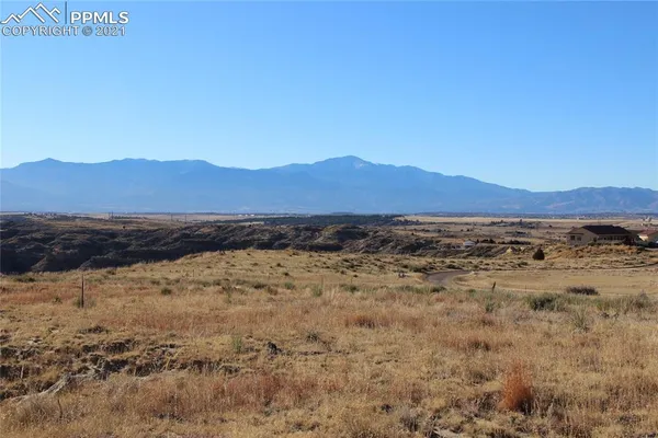 a view of an outdoor space and mountain view