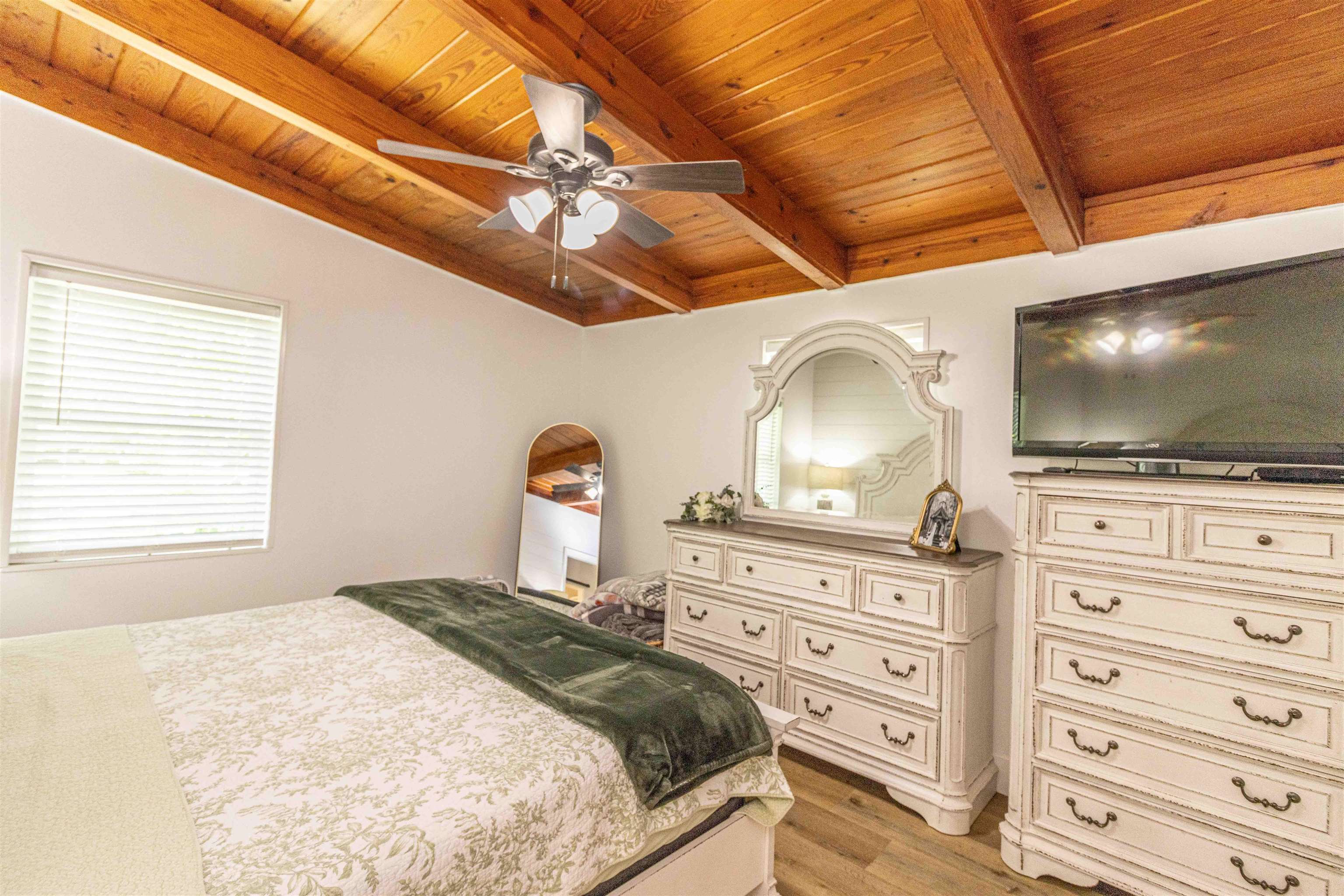 3285 Highway 57 Ramer, TN 38367 - Photo 13 of 22 a bedroom with a bed and a flat screen tv