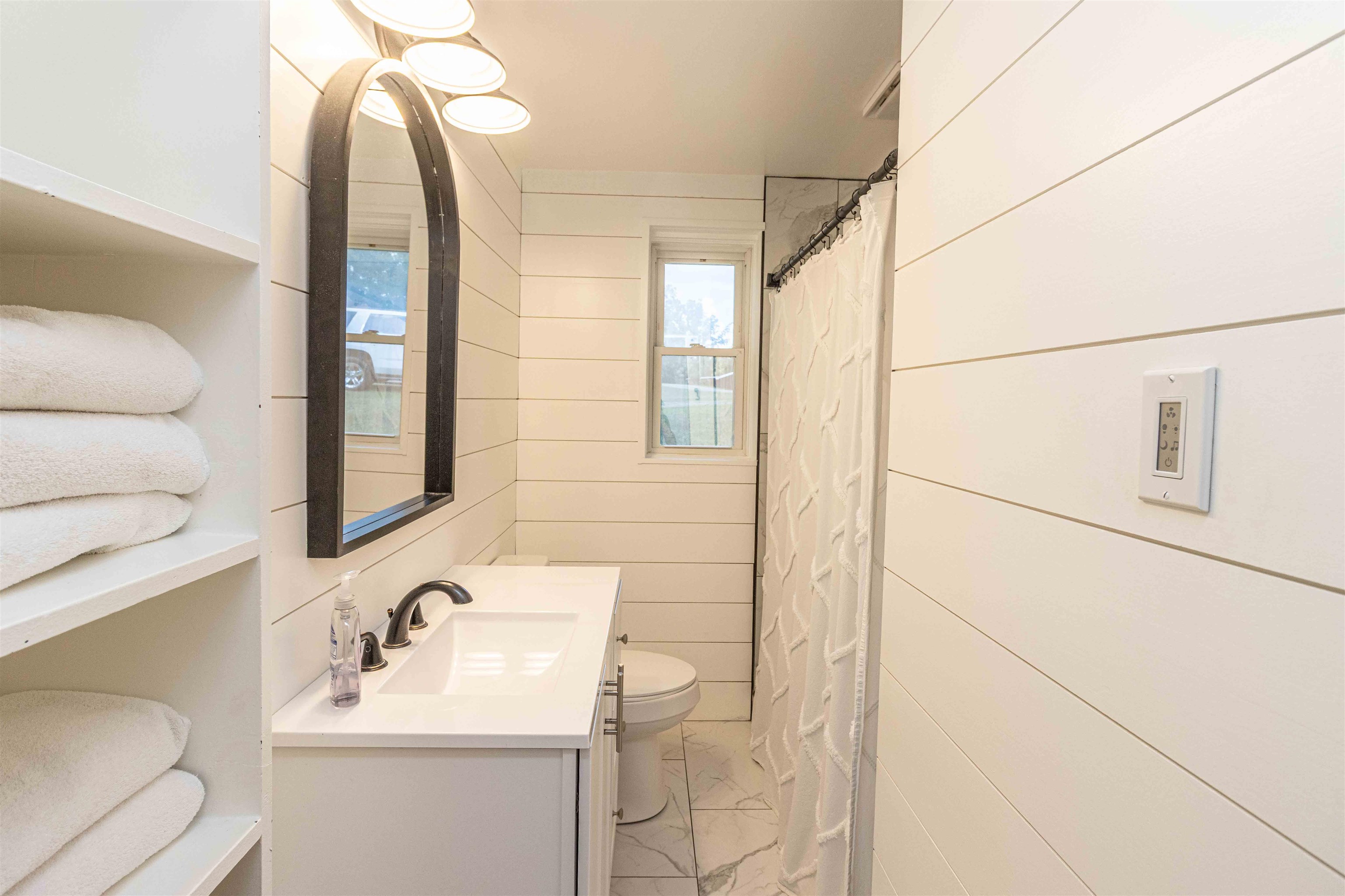 3285 Highway 57 Ramer, TN 38367 - Photo 15 of 22 a bathroom with a sink and a mirror