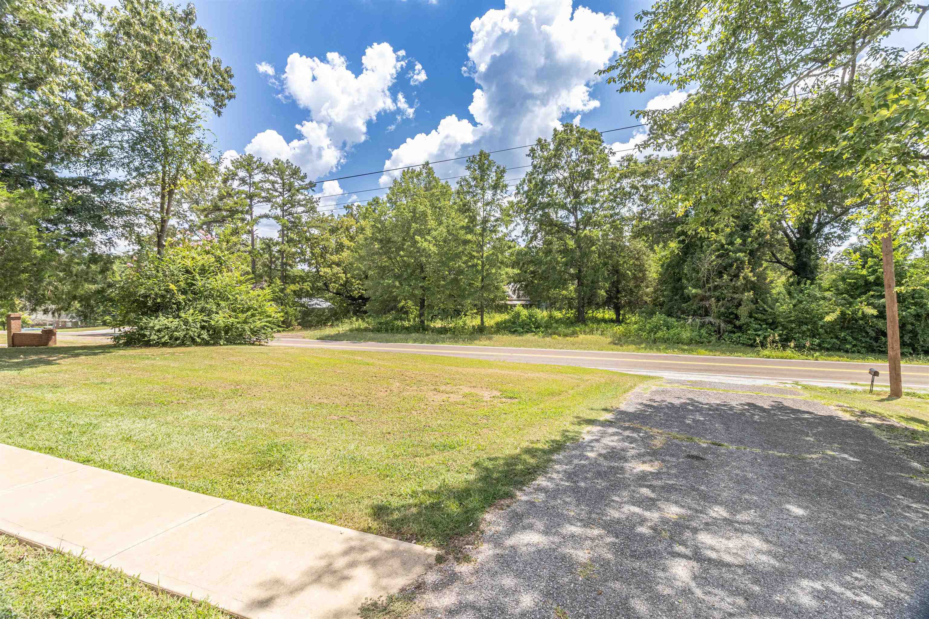 3285 Highway 57 Ramer, TN 38367 - Photo 21 of 22 a view of a swimming pool with an outdoor space and seating area