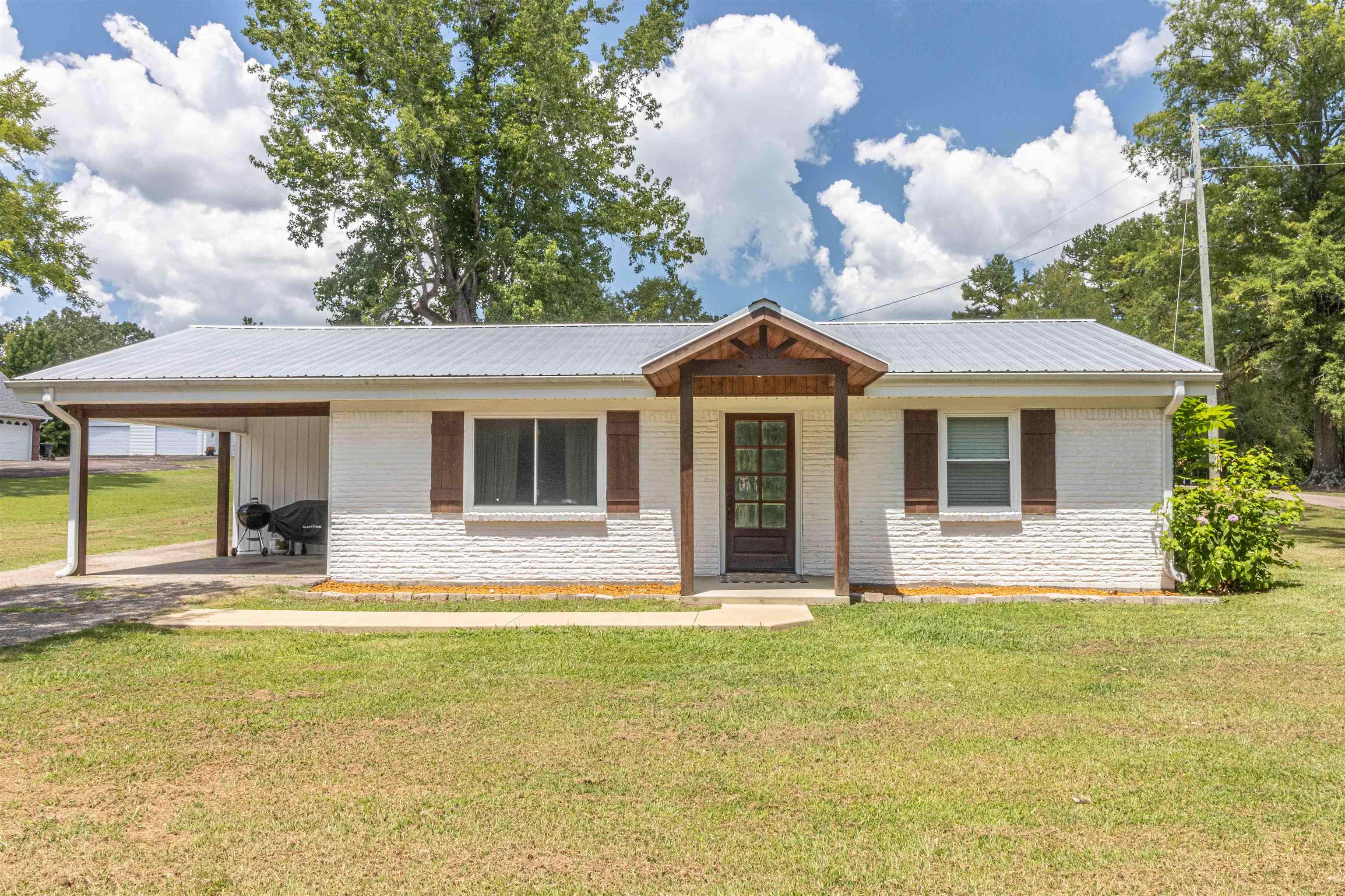 3285 Highway 57 Ramer, TN 38367 - Photo 22 of 22 a front view of a house with a yard