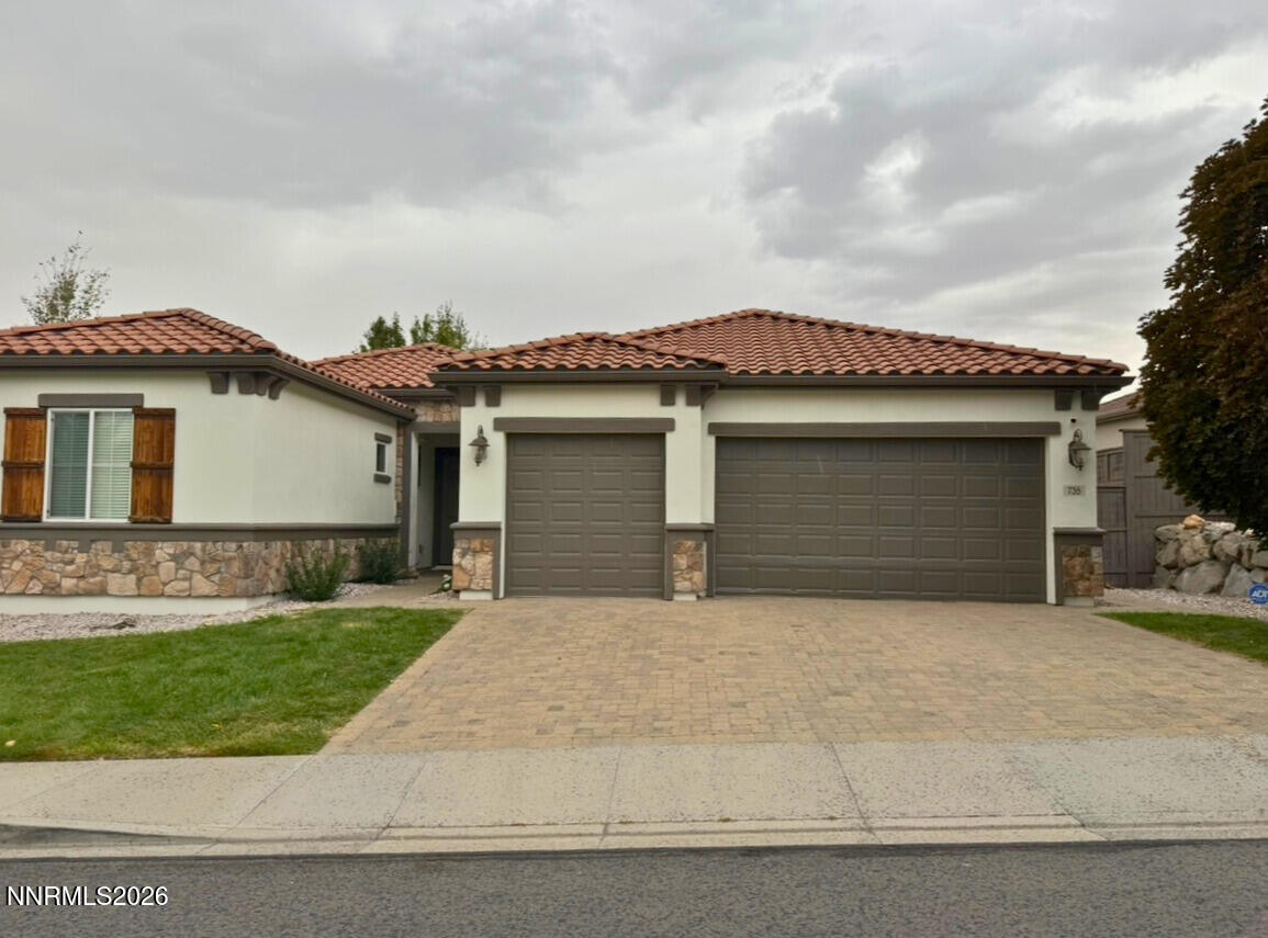 735 Sienna Park Drive Reno, NV 89512 - Photo 1 of 24 front view of house with a yard